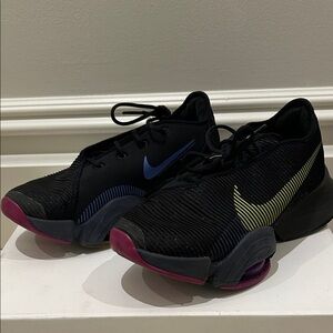 Nike Black Sneakers with Blue and Yellow Swooshes